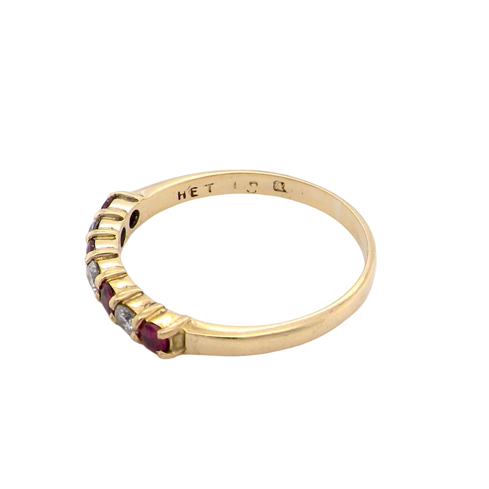 A Ruby and Diamond eternity ring 7 stone