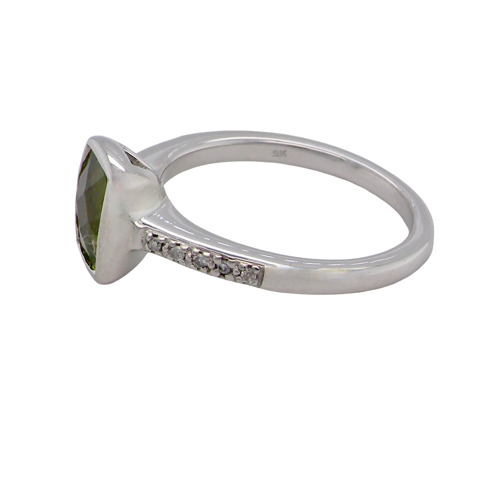 A 9 Carat White Gold Peridot & Diamond Ring