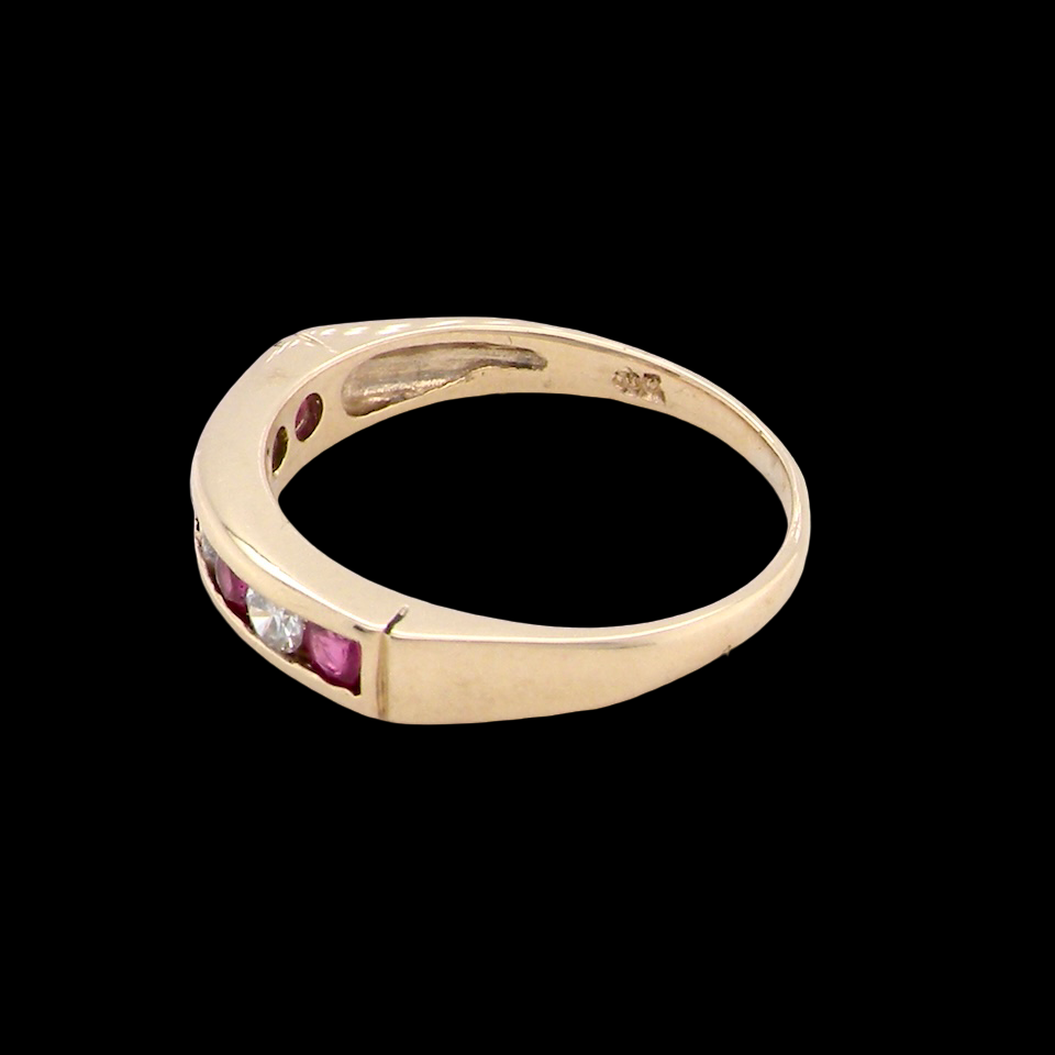 A 9 carat Yellow Gold Ruby & Diamond Eternity Ring