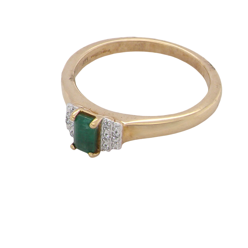 side A 9 carat gold ring that features a rectangular cut emerald, 5x3mm (est 0.30 carats)