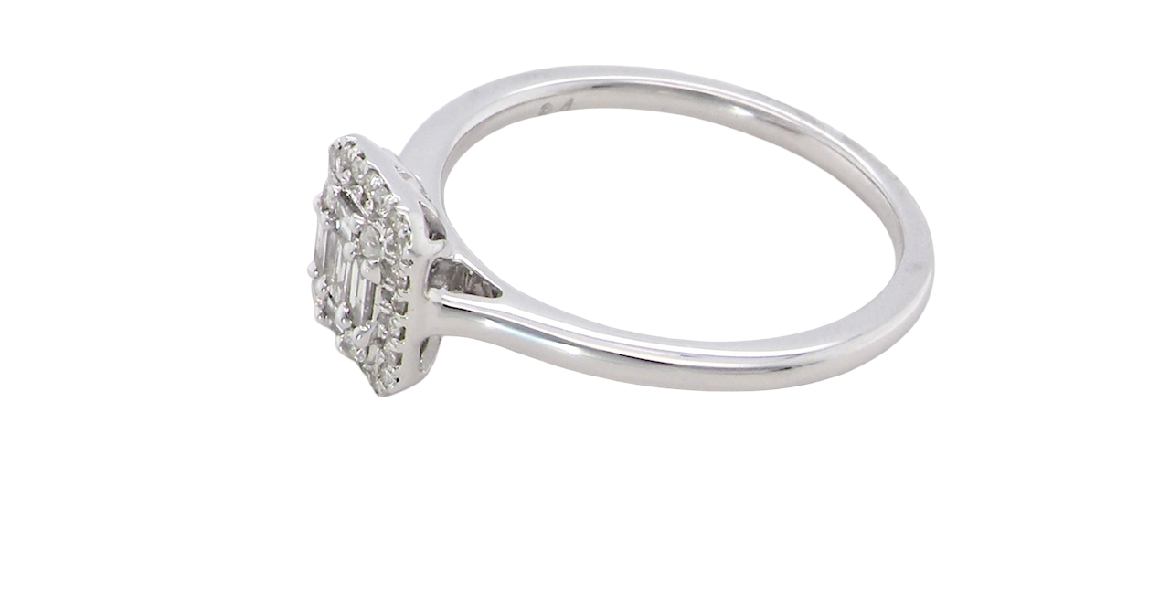 side A 9 carat white gold cluster ring. The centre is set with five baguette cut white diamonds, 3 x 2x1.2mm, 2 x 1mm.