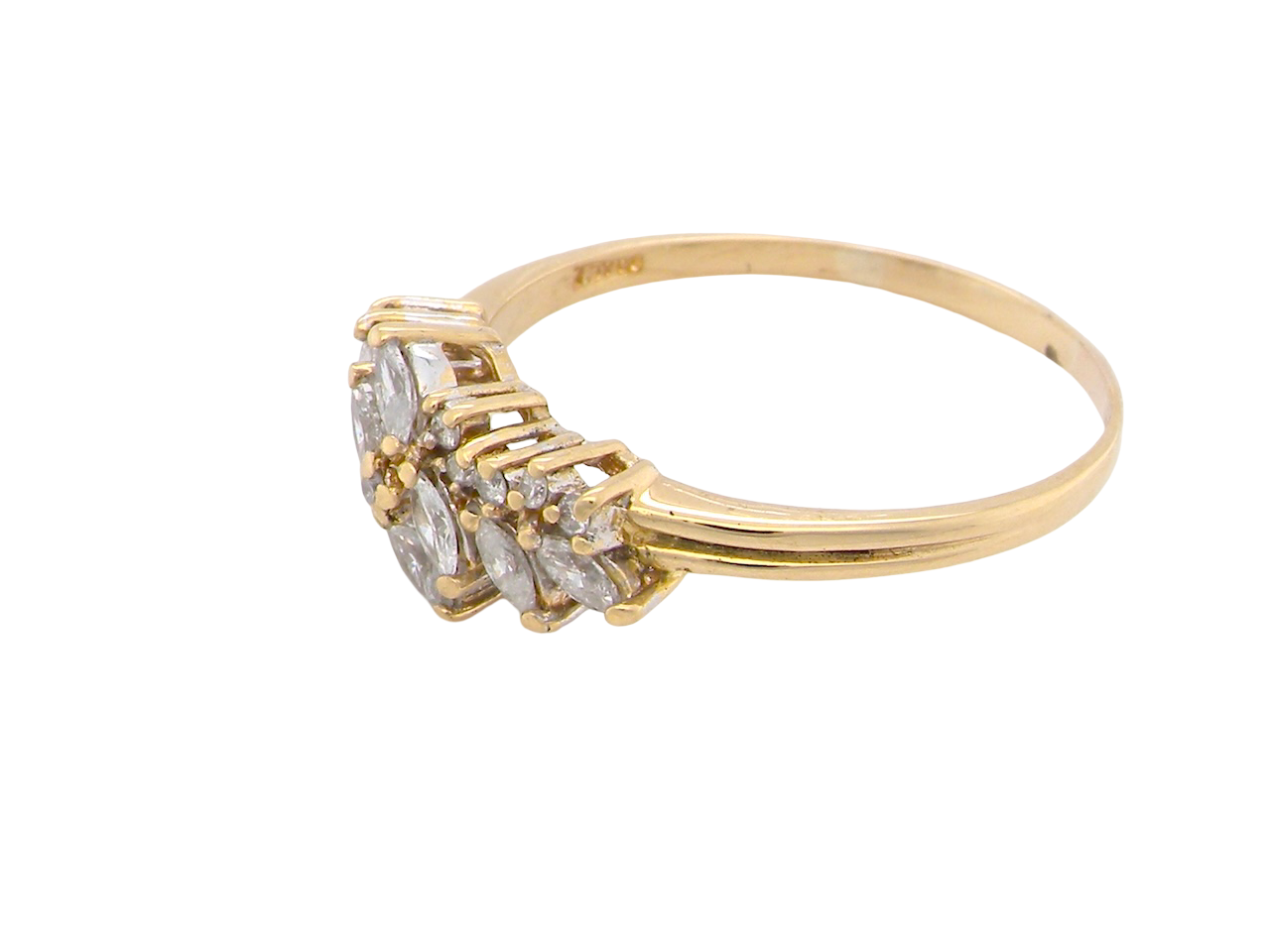 Gold ring with diamond-like stones on a white background