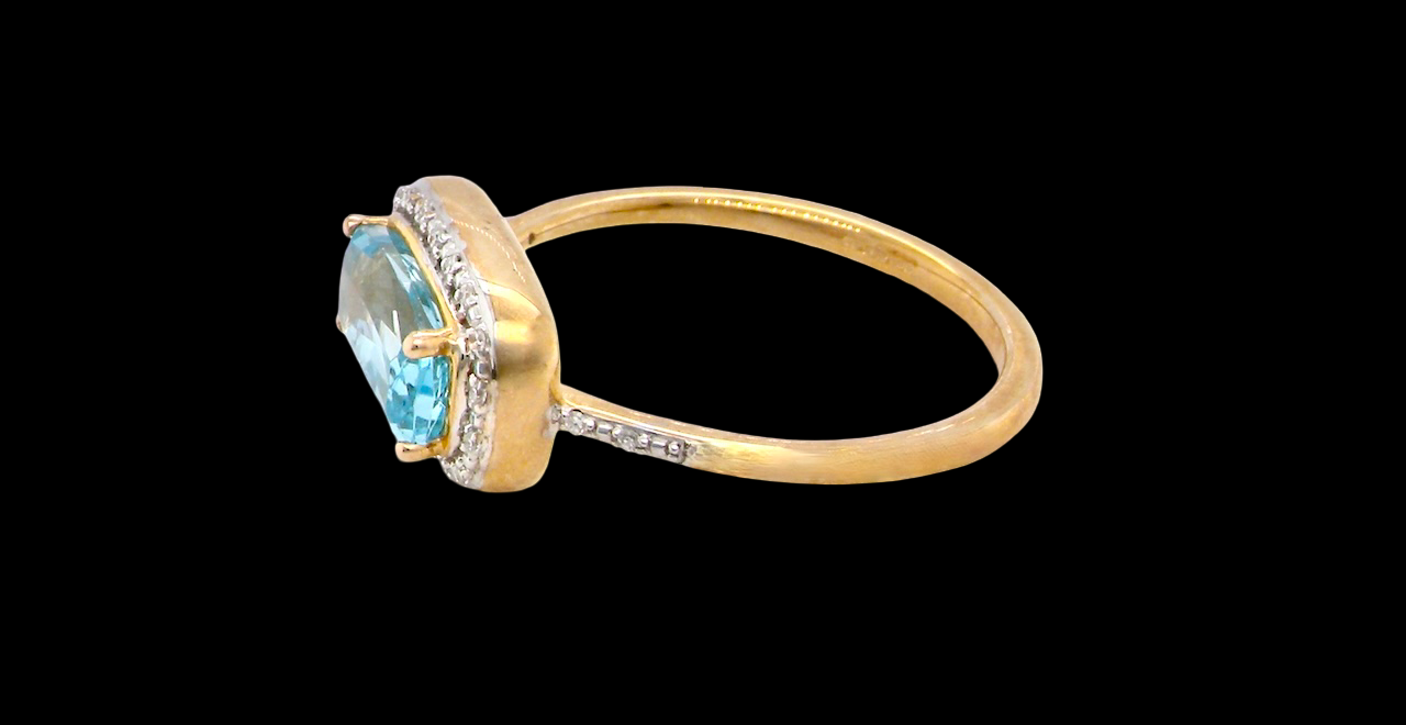 A Rectangular Blue Topaz & Diamond Cluster Ring