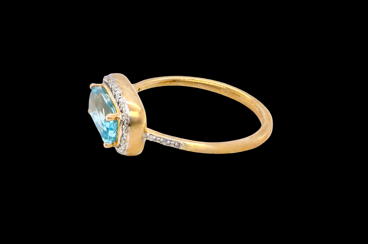 A Rectangular Blue Topaz & Diamond Cluster Ring