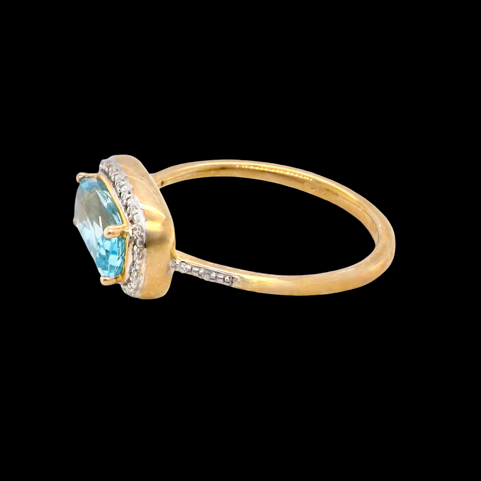 A Rectangular Blue Topaz & Diamond Cluster Ring