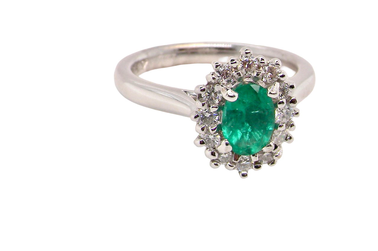 A NEW Emerald and Diamond ring
