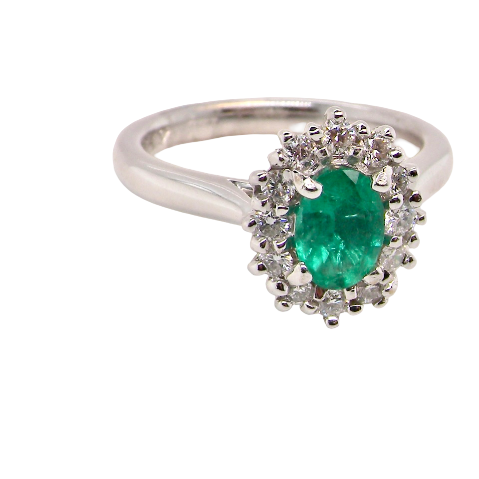 A NEW Emerald and Diamond ring