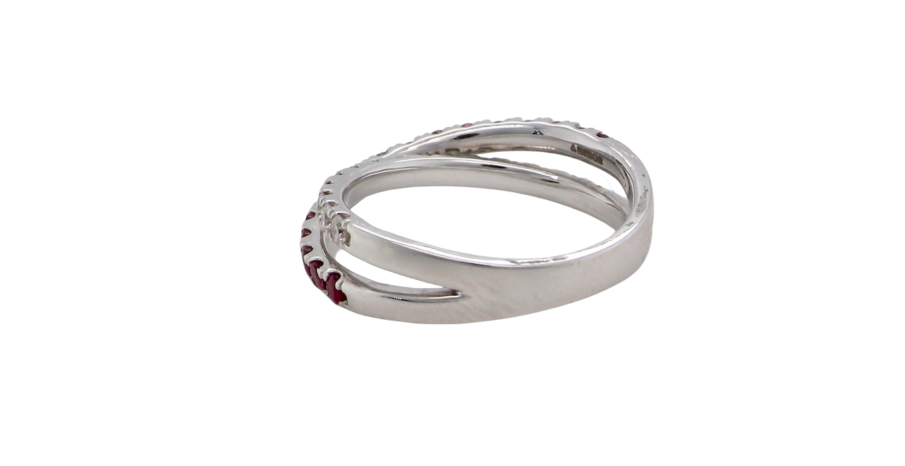 A NEW ruby and diamond cross over ring