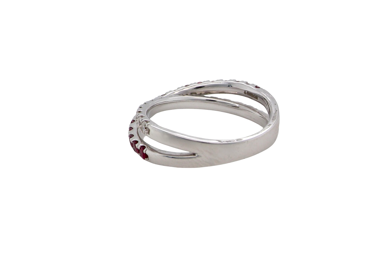 A NEW ruby and diamond cross over ring