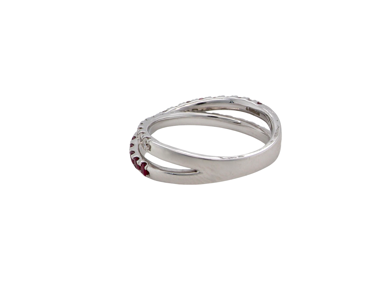 A NEW ruby and diamond cross over ring