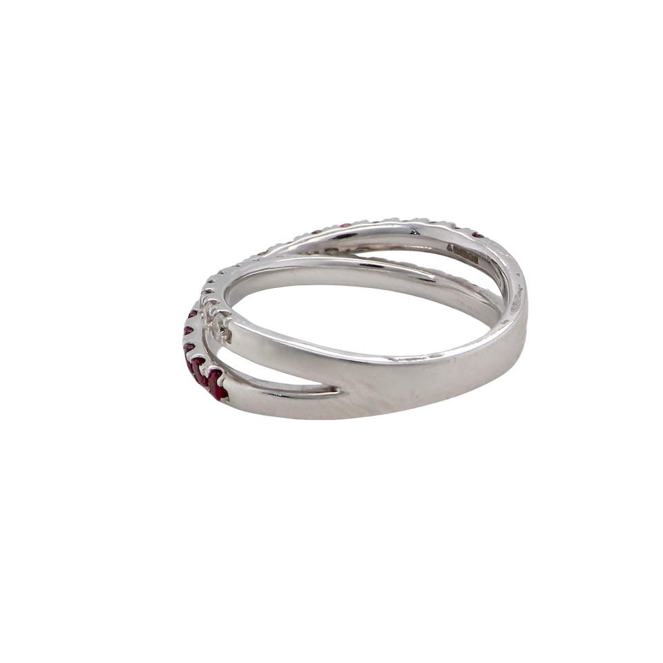 A NEW ruby and diamond cross over ring