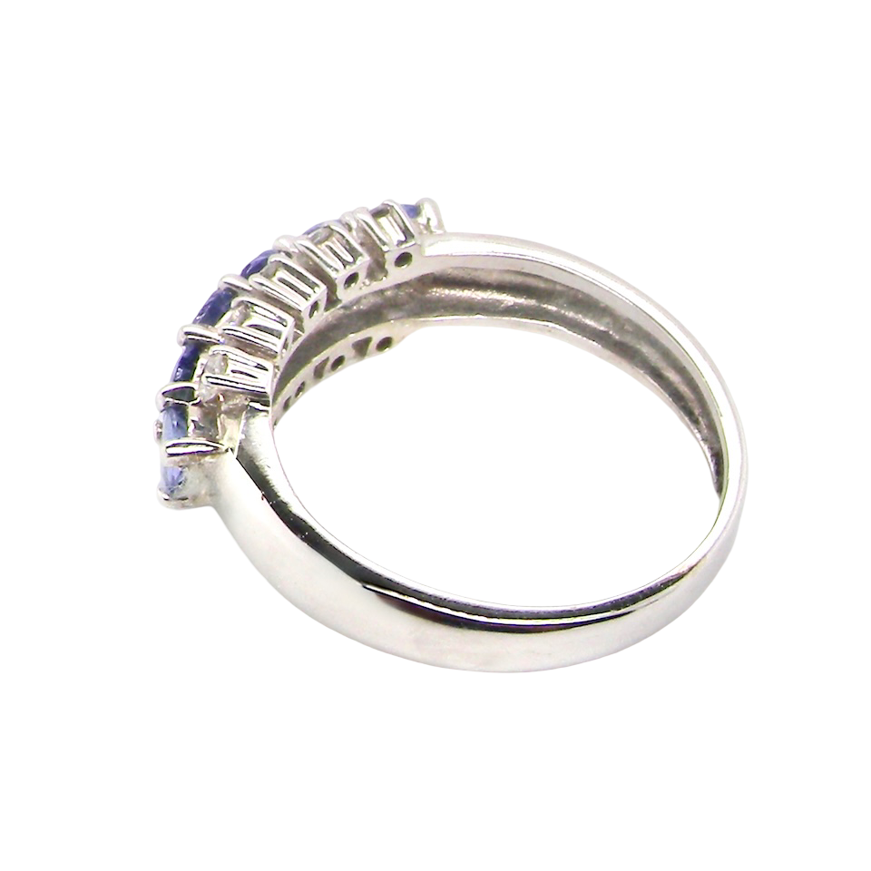 A Tanzanite and Diamond half hoop ring