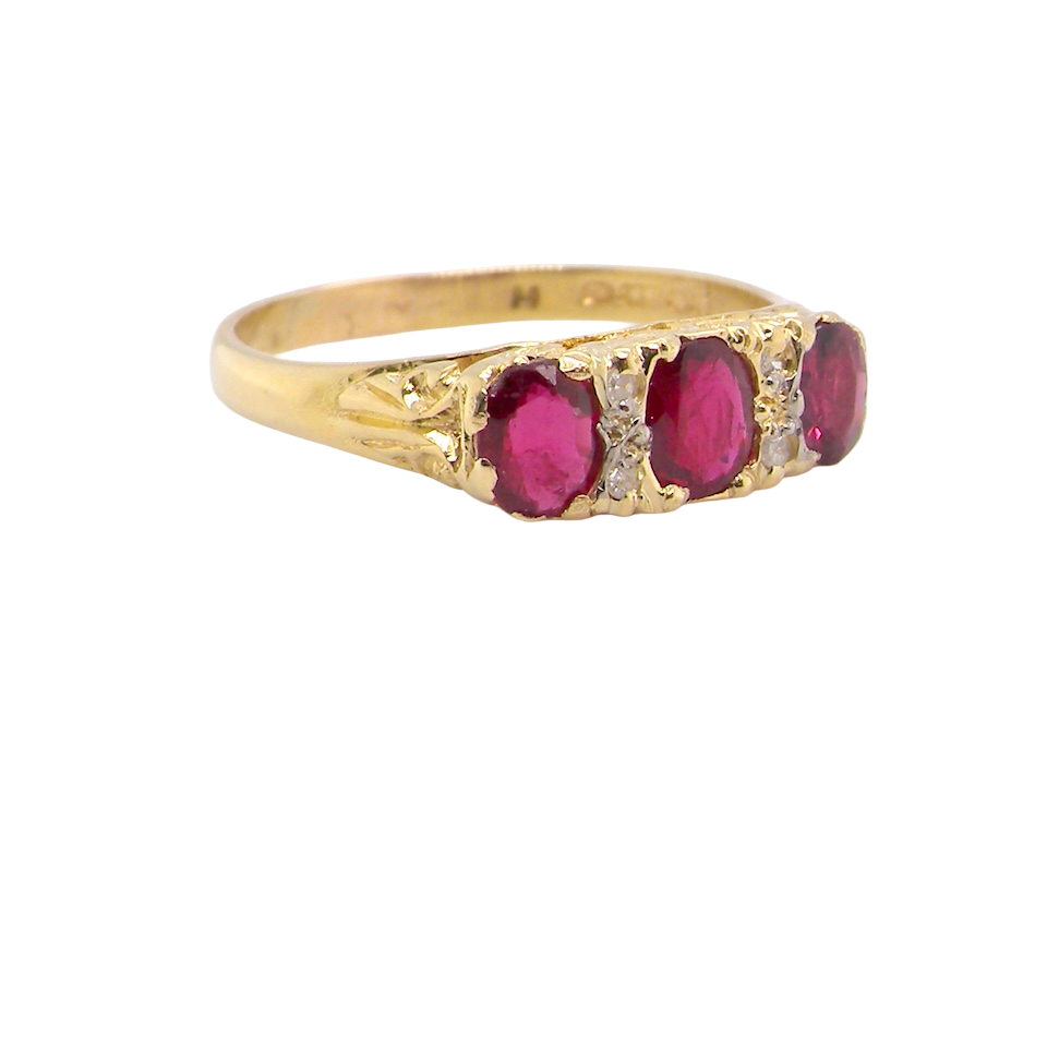 A Victorian Style 18 carat Gold Ruby & Diamond Boat Ring (London 1978)