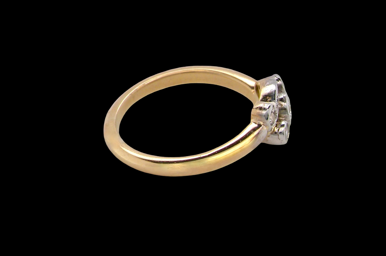 A Vintage Platinum & 18 carat Gold Diamond Crossover Ring (c.1930–1940)