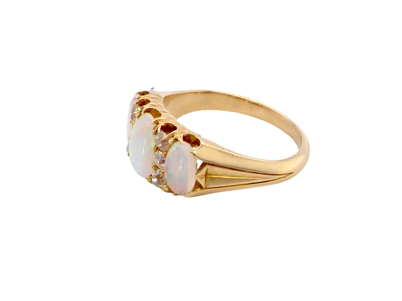 side A beautiful Victorian dress ring, set with three finely matched oval opals,
