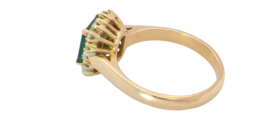 side A beautiful cluster ring set with a large square-cut emerald measuring approximately 7 x 7mm, displaying a deep grass-green colour with natural inclusions, as expected in emeralds.