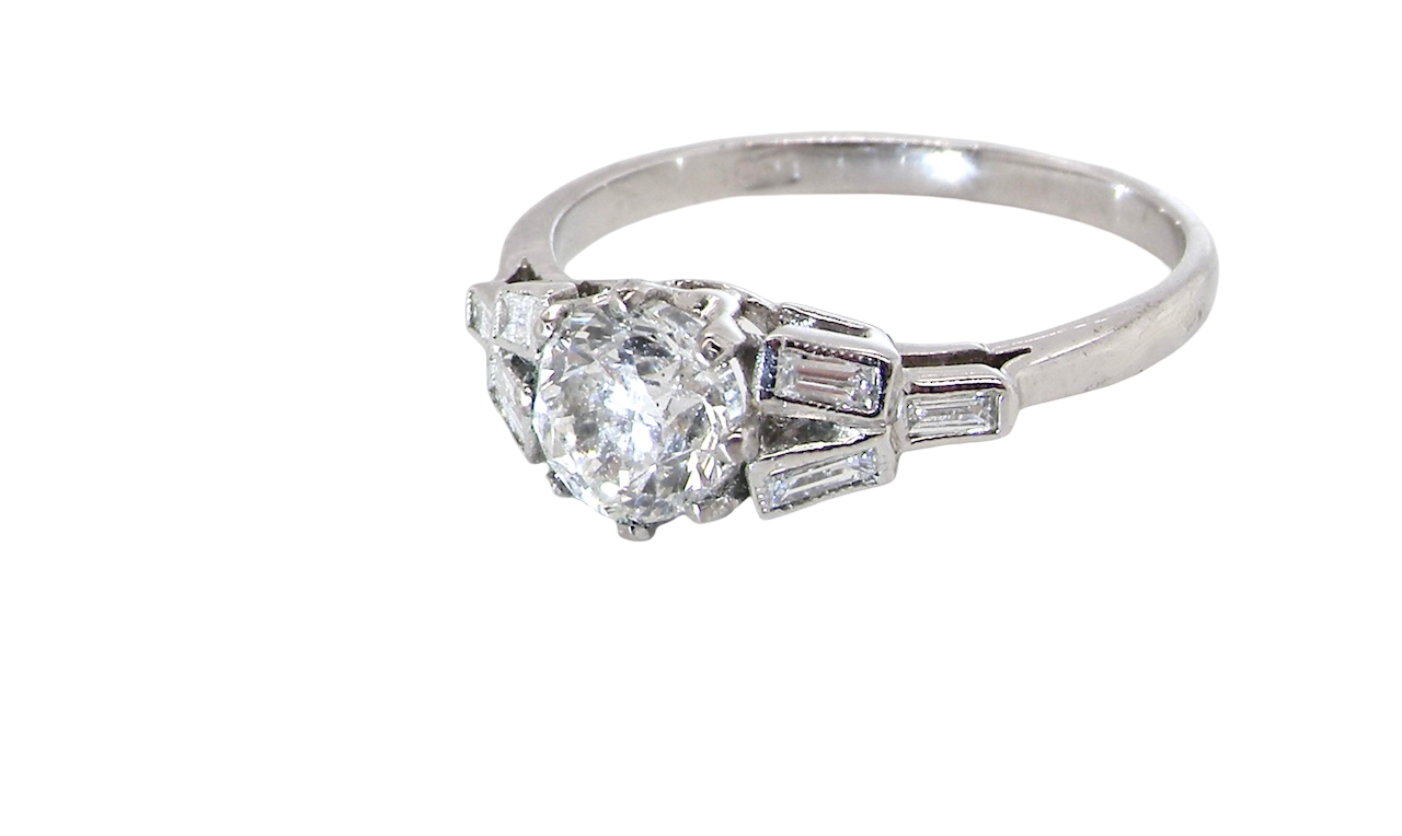 side A beautifully proportioned Art Deco solitaire ring showcasing a sparkling old brilliant cut white diamond