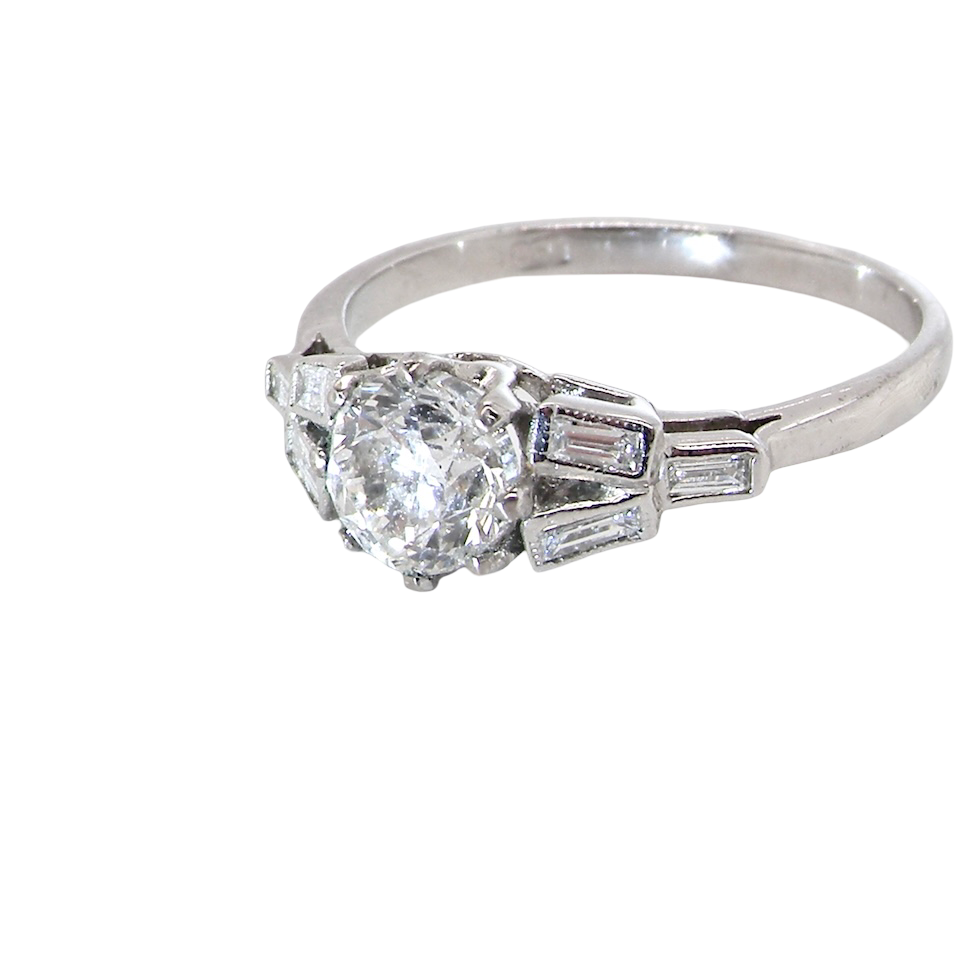 side A beautifully proportioned Art Deco solitaire ring showcasing a sparkling old brilliant cut white diamond