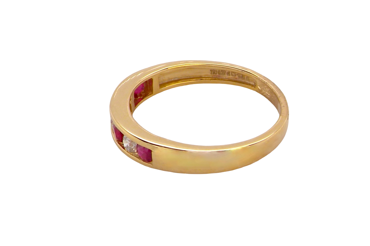 A channel set Ruby and Diamond ring