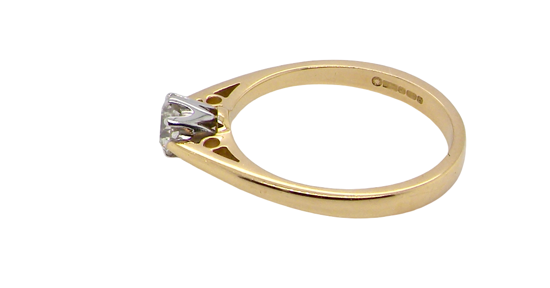 side A classic solitaire ring. Features a single brilliant cut white diamond, measures 5mm (est 0.50 carats) Colour H-j, clarity Si.
Head is claw set, platinum, head 5.2mm, depth 5.4mm, weight 2.9 grams. 
