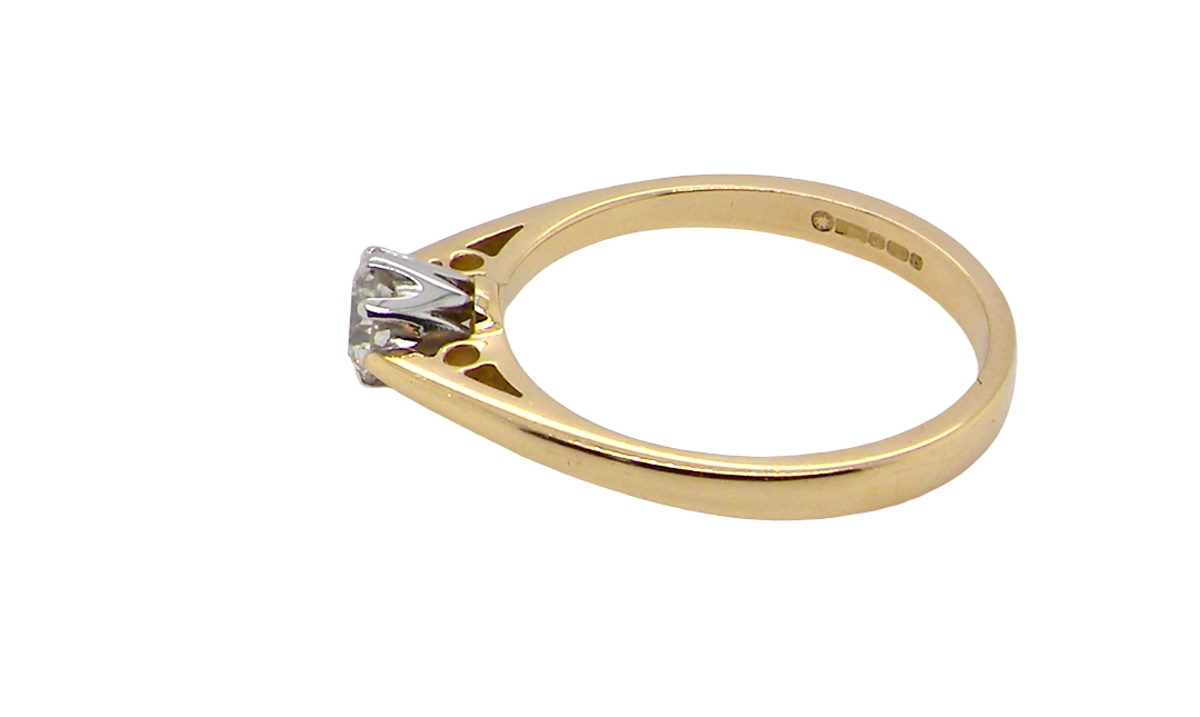 side A classic solitaire ring. Features a single brilliant cut white diamond, measures 5mm (est 0.50 carats) Colour H-j, clarity Si.
Head is claw set, platinum, head 5.2mm, depth 5.4mm, weight 2.9 grams. 