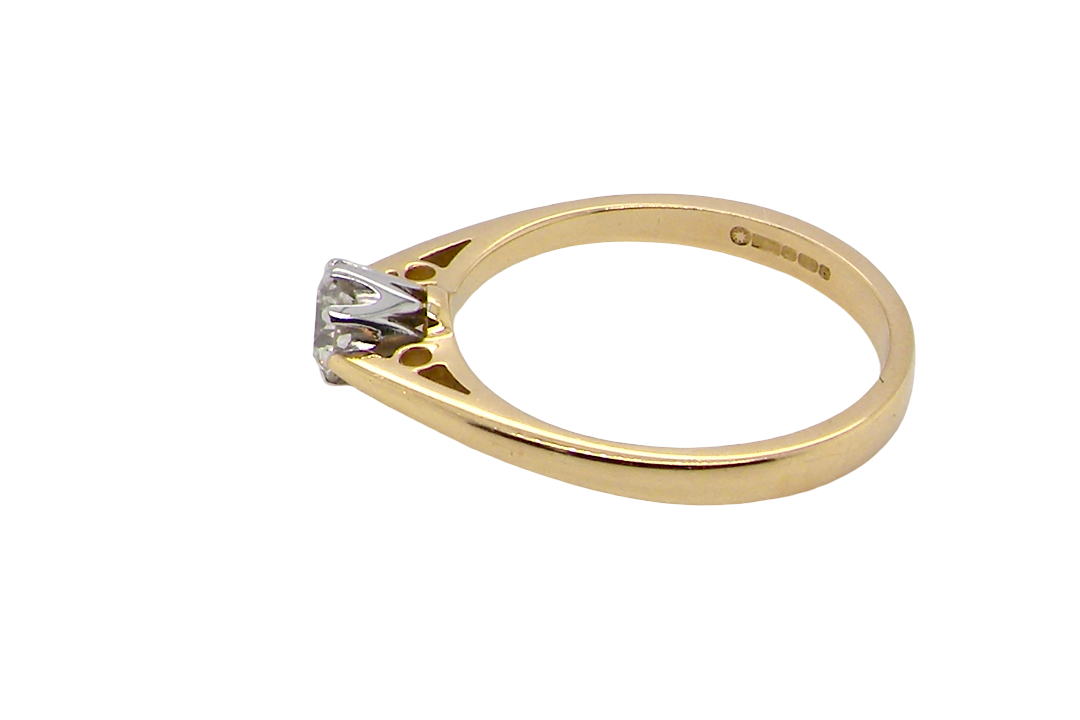 side A classic solitaire ring. Features a single brilliant cut white diamond, measures 5mm (est 0.50 carats) Colour H-j, clarity Si.
Head is claw set, platinum, head 5.2mm, depth 5.4mm, weight 2.9 grams. 