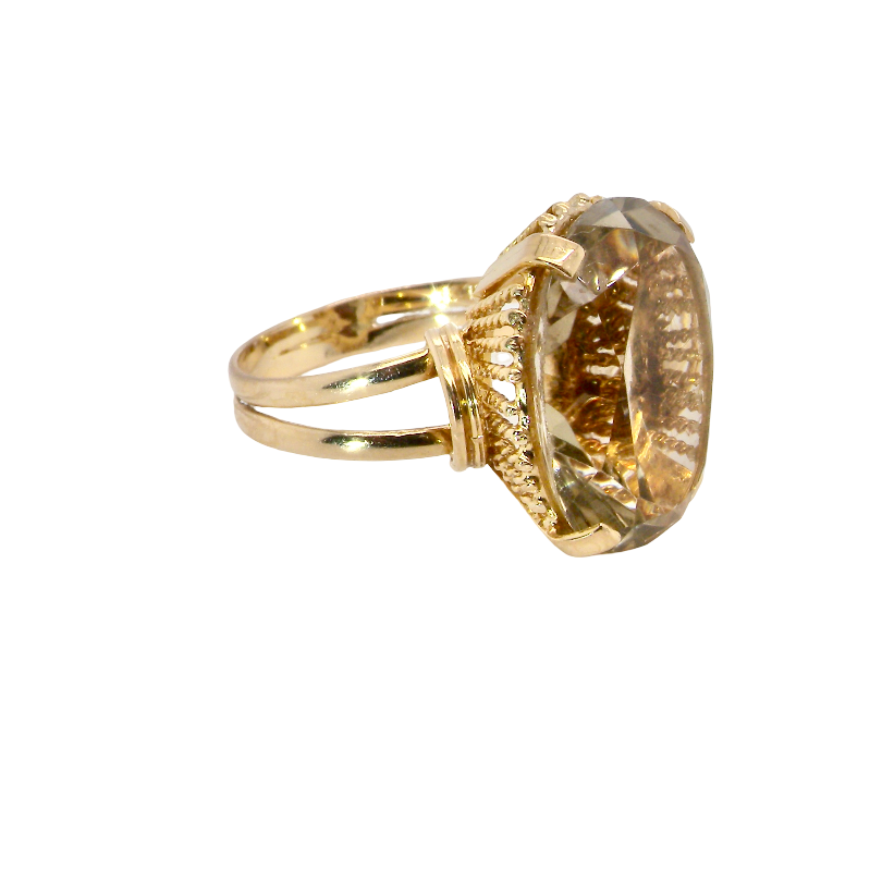 side A continental dress ring that tests as 18 carat gold. Features a large citrine gemstone, that measures 18x13mm, depth 9mm. Golden yellow with a hint of olive green. 