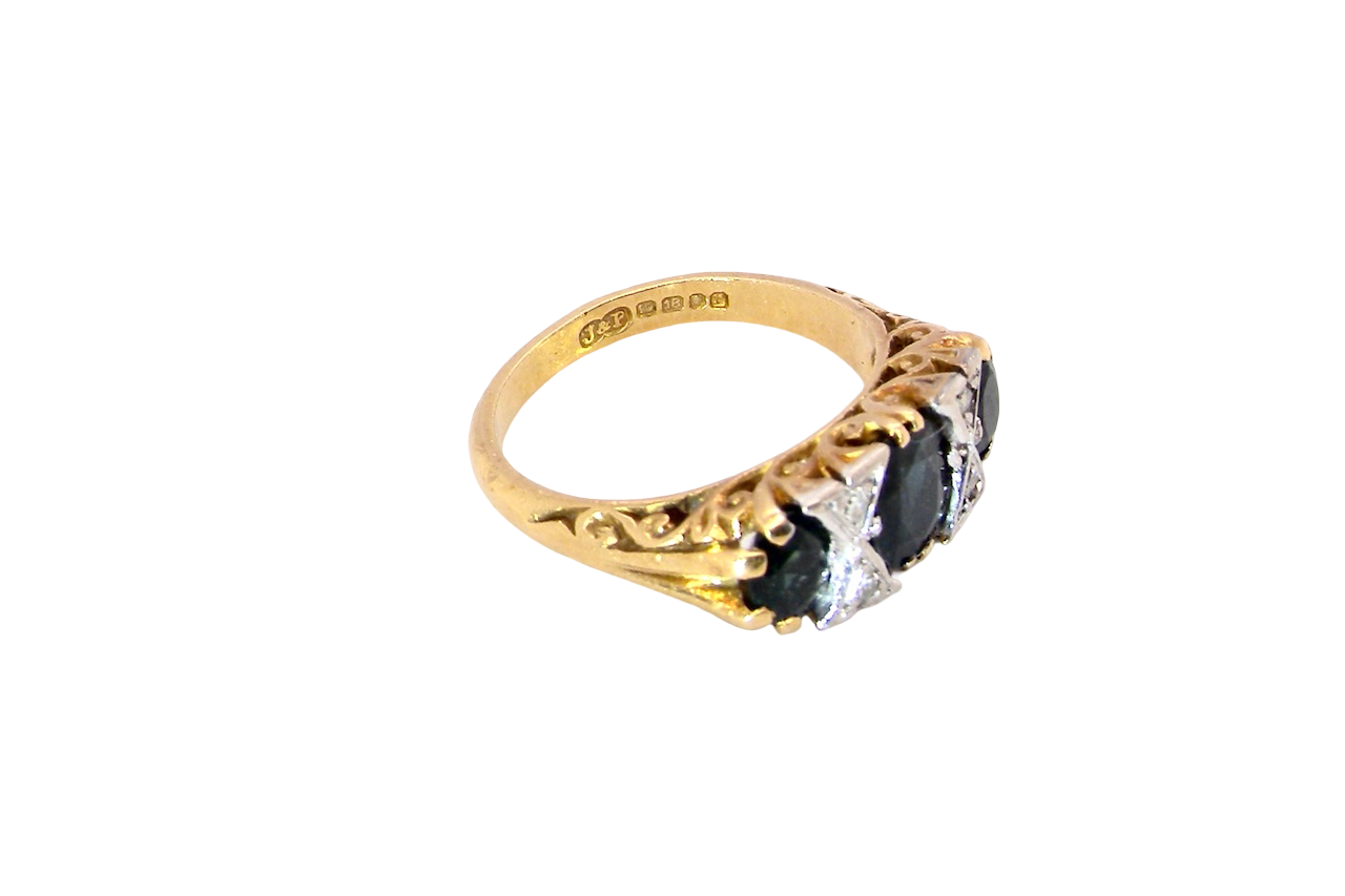 side A faithful reproduction of a Victorian design. This ring from the early 1970s has copied the original boat shaped style from that period. 