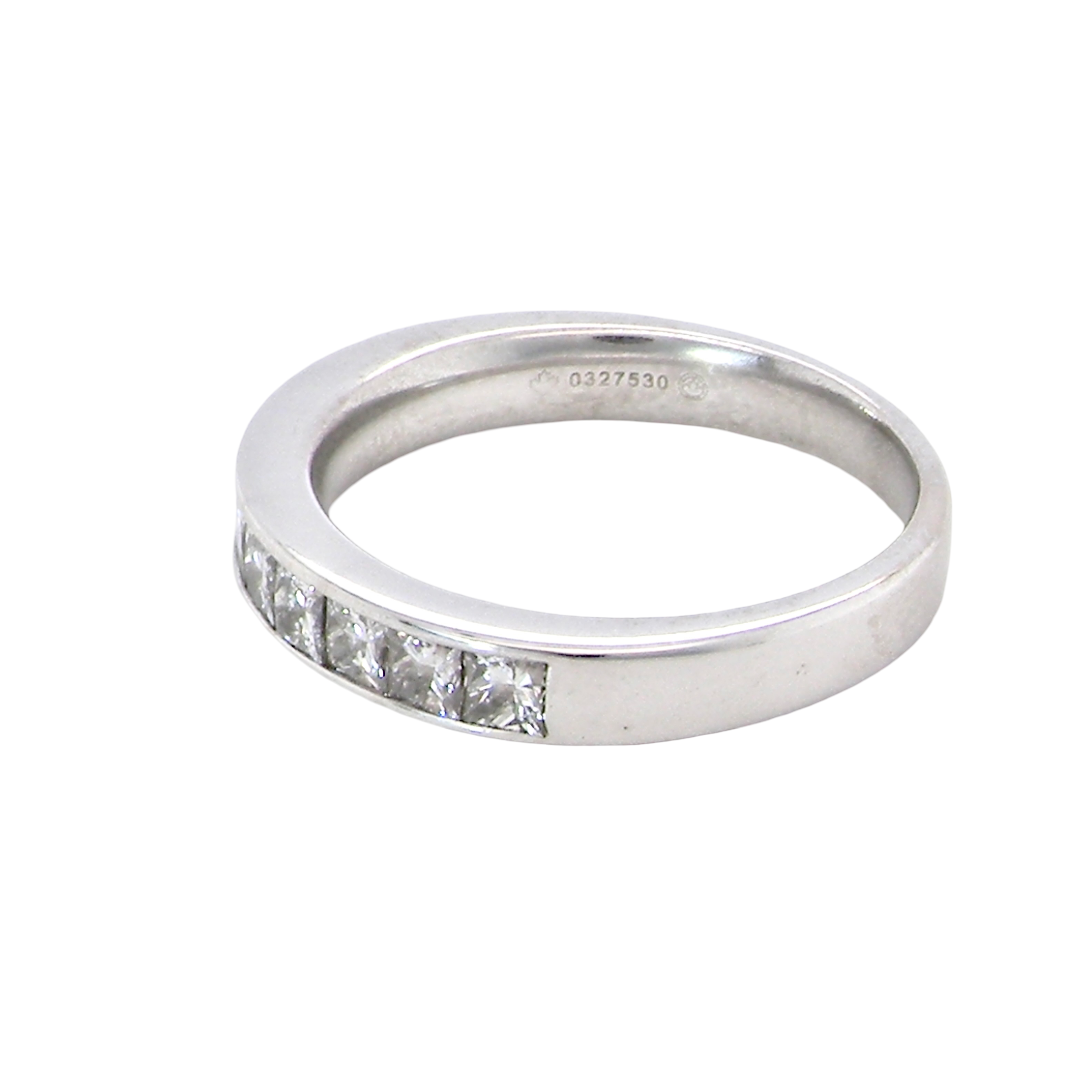 side A fine 18 carat white gold half hoop eternity ring. Set with ten princess cut white diamonds.
Close set, each 2.5x2.5mm, total one carat