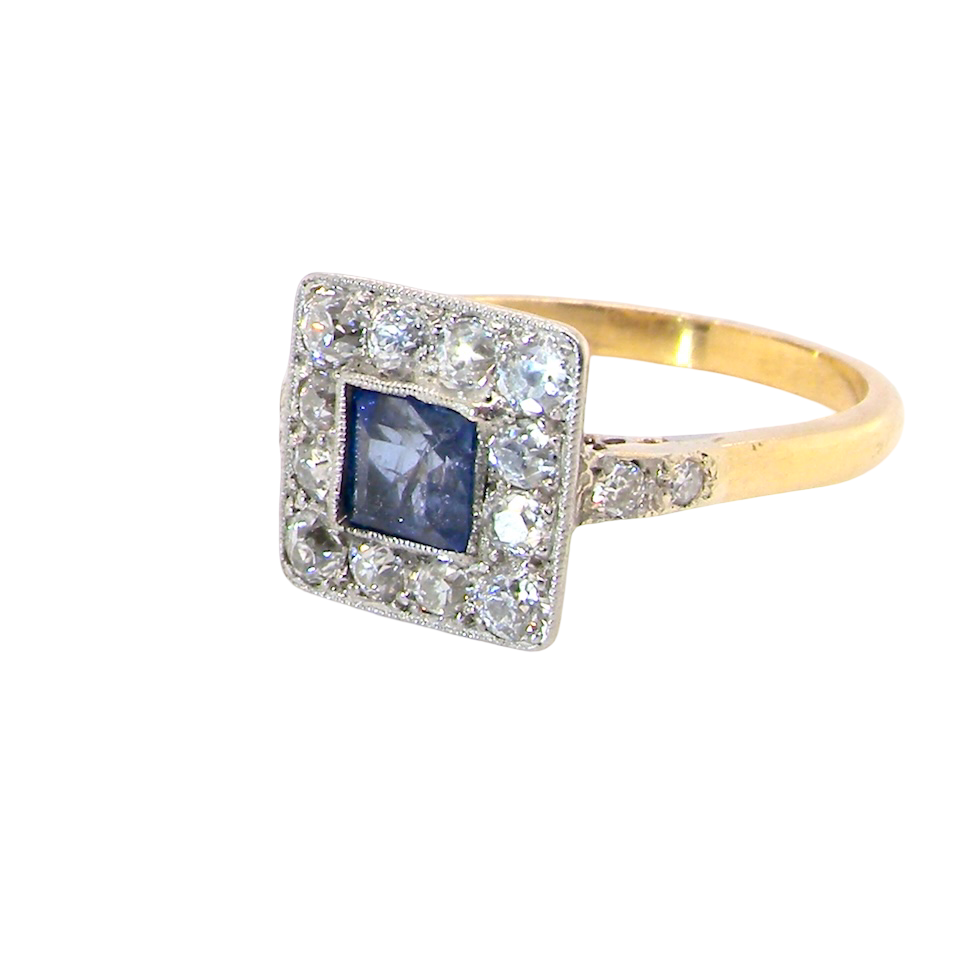side A fine Art Deco cluster ring. The centre stone a square sapphire 5x5mm (est 0.50 carats) in a mille grain setting.