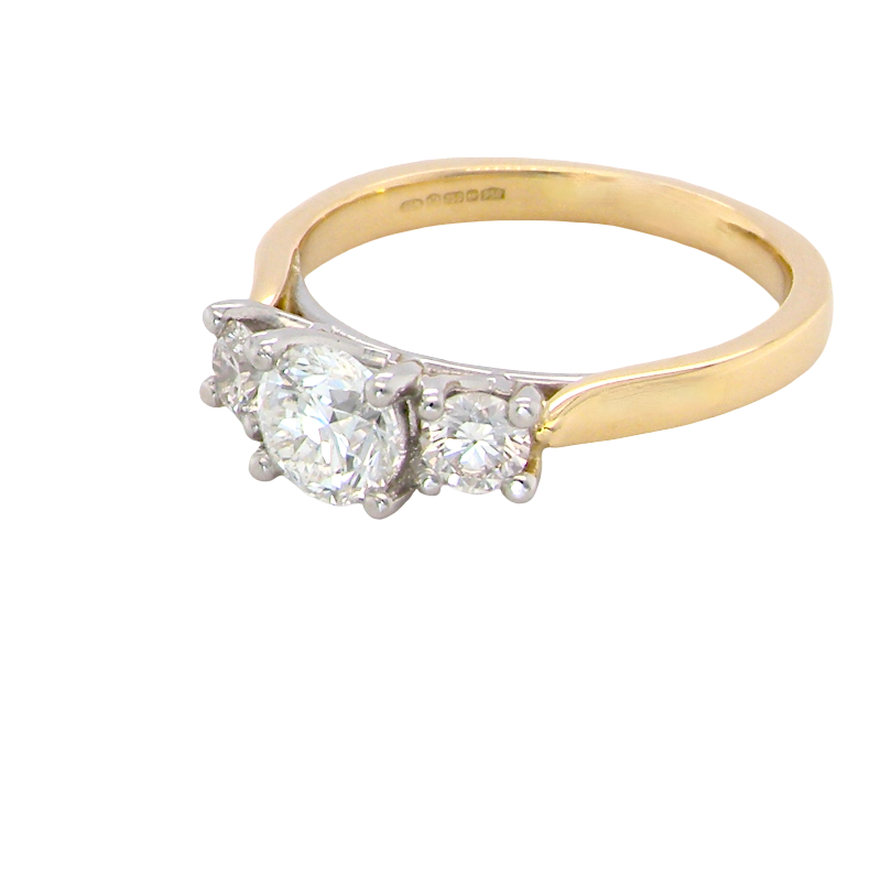 side A fine and impressive three stone diamond trilogy ring, beautifully set with three graduated brilliant cut white diamonds.