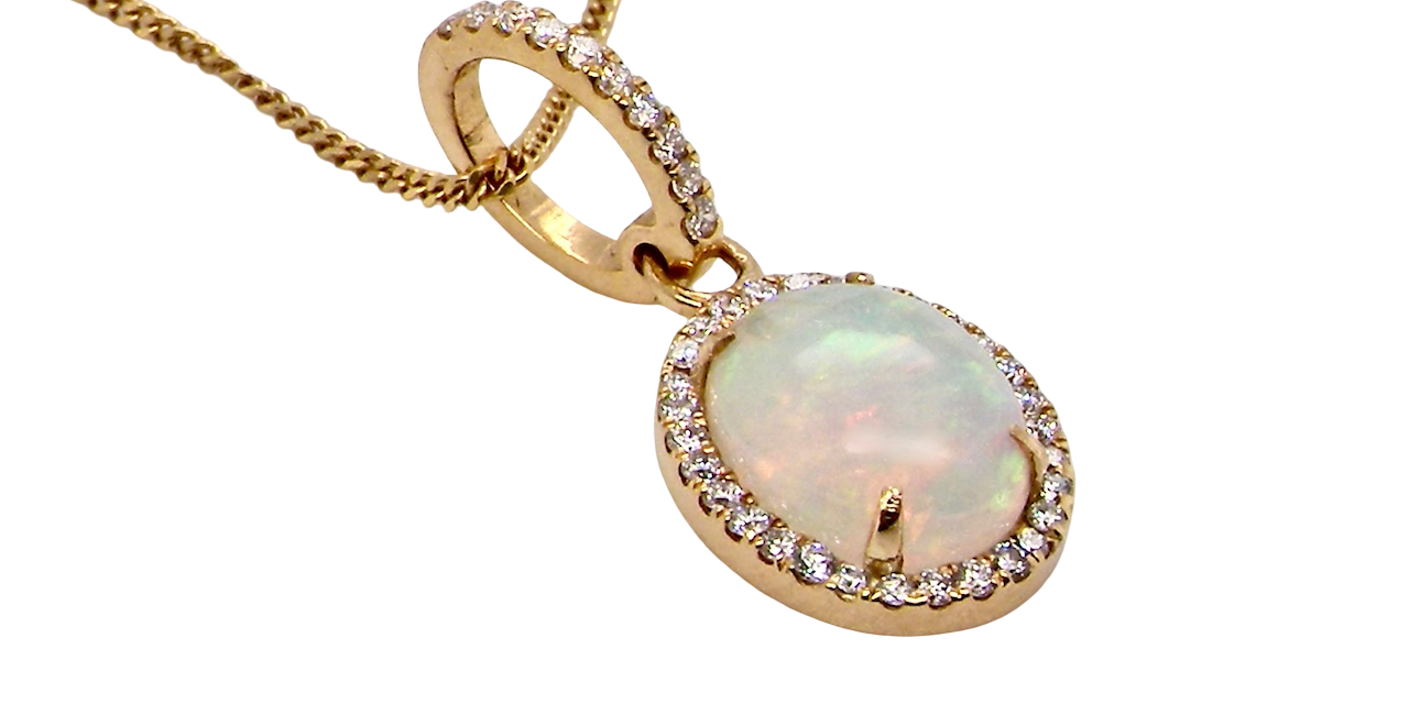 A fine opal and diamond pendant