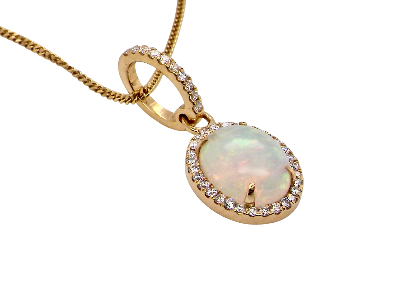 A fine opal and diamond pendant