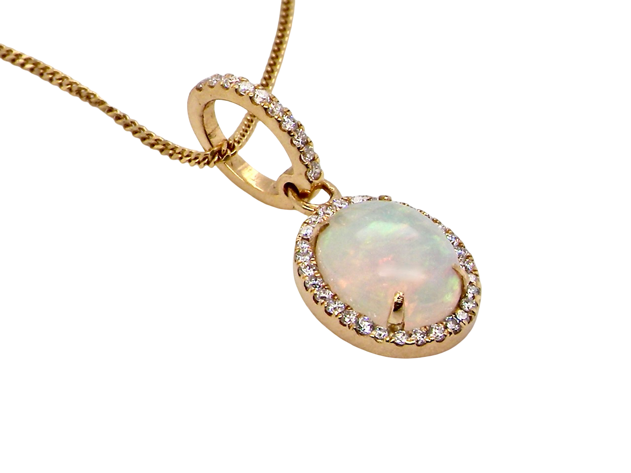 A fine opal and diamond pendant