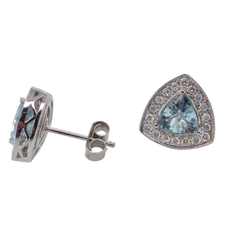 side A fine pair of 18 carat white gold cluster earrings, each containing a trapeze cut aquamarine 6x6x6mm (1 carat) surrounded by eighteen x 0.02 carat brilliant cut white diamonds.