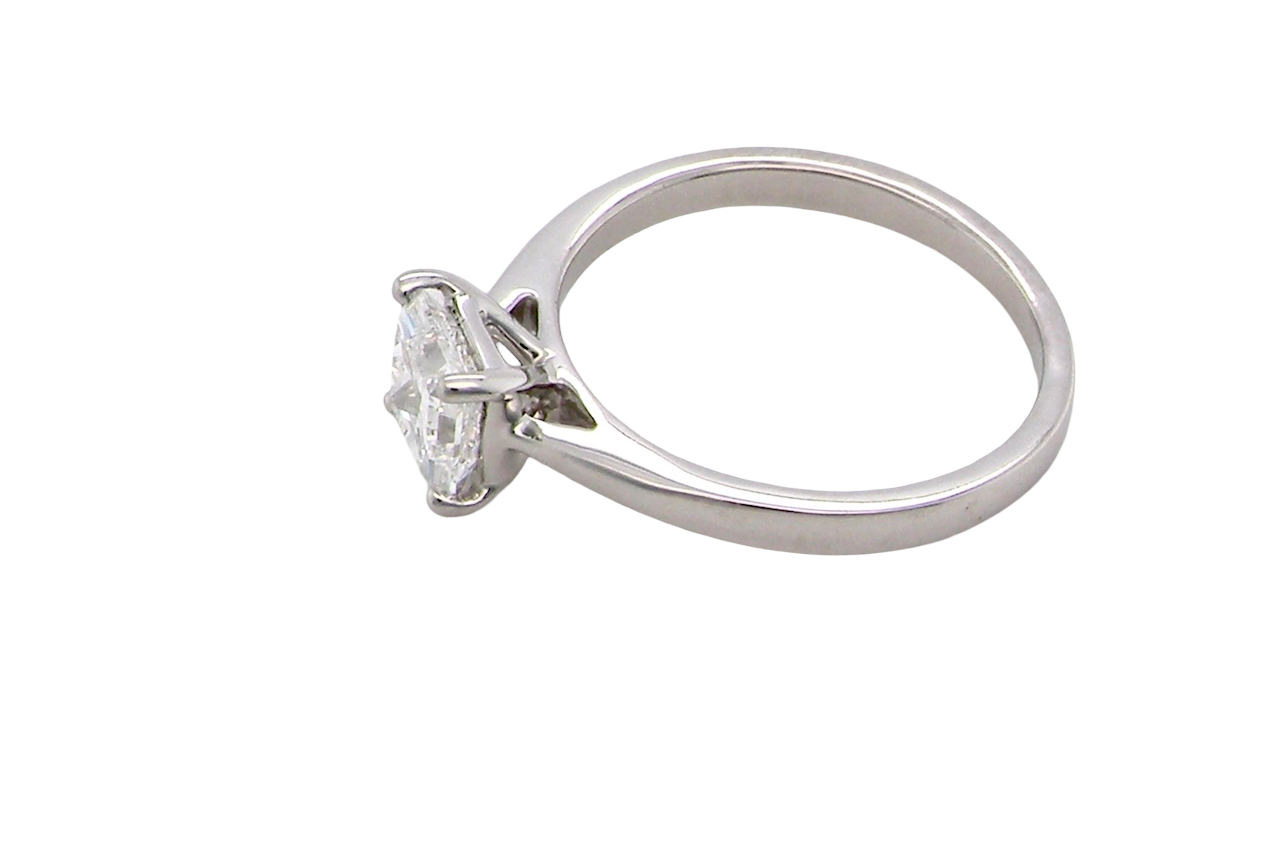 side A fine solitaire ring featuring a square cut diamond of excellent quality.
Superb colour grade of E, excellent clarity- graded VVS2*. Stone measures 5x5x3.68, confirmed as 0.83 carats.