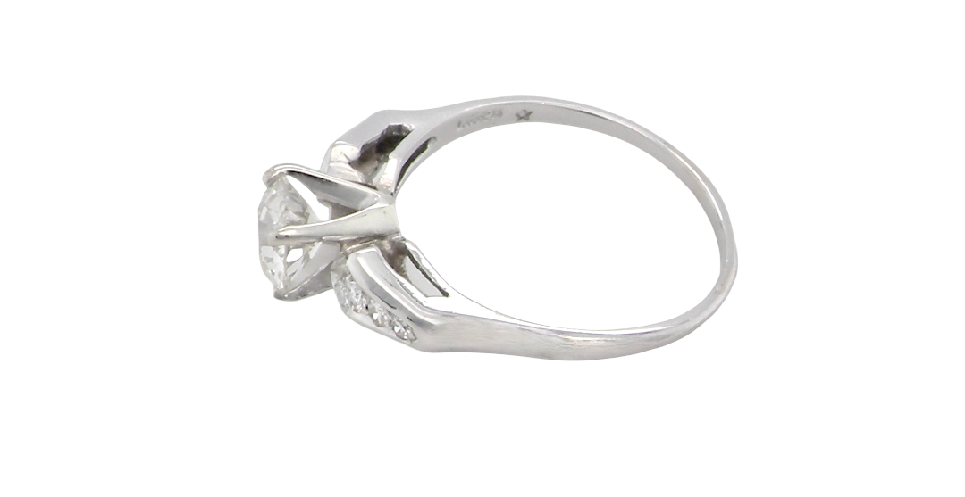 side A fine solitaire ring featuring an e lovely brilliant cut white diamond. Measures 6.3mm (est 0.85 carats) very bright white stone, colour H-i, clarity VS. Head depth 7mm. 