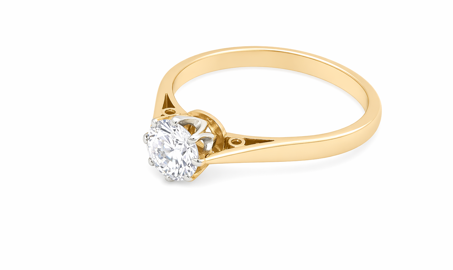 side A fine solitaire ring set with a brilliant cut white diamond.
Certificated and therefore the description is confirmed. Size 5.5x5.2mm, 0.70 carats. Colour G, clarity Si1.