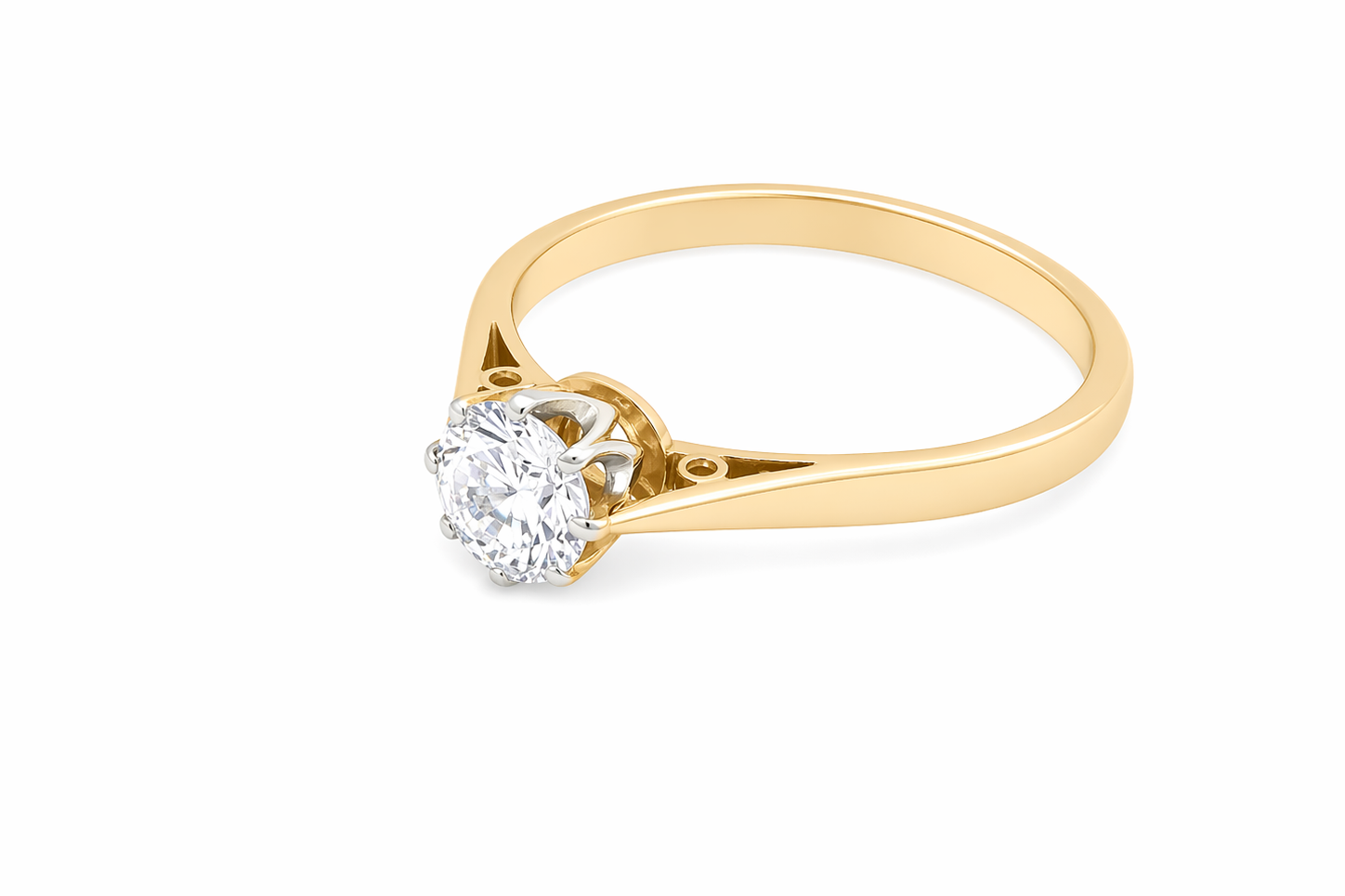 side A fine solitaire ring set with a brilliant cut white diamond.
Certificated and therefore the description is confirmed. Size 5.5x5.2mm, 0.70 carats. Colour G, clarity Si1.