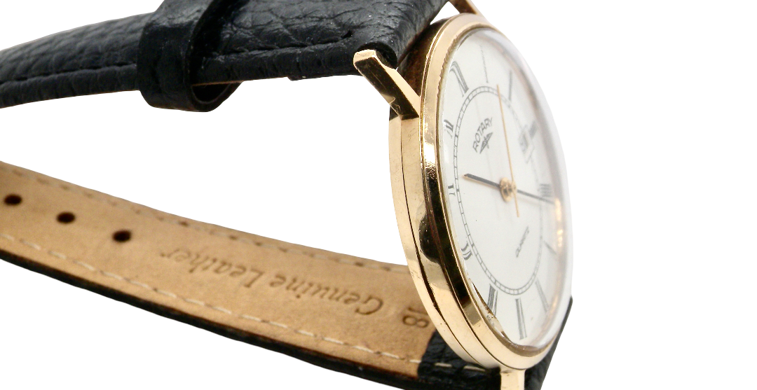 side A gentleman's 9 carat gold wrist watch. Plain white dial with roman numerals, sweep seconds hand, and a calendar date window.
Case measures 32mm. Quartz movement. Signed by Rotary.