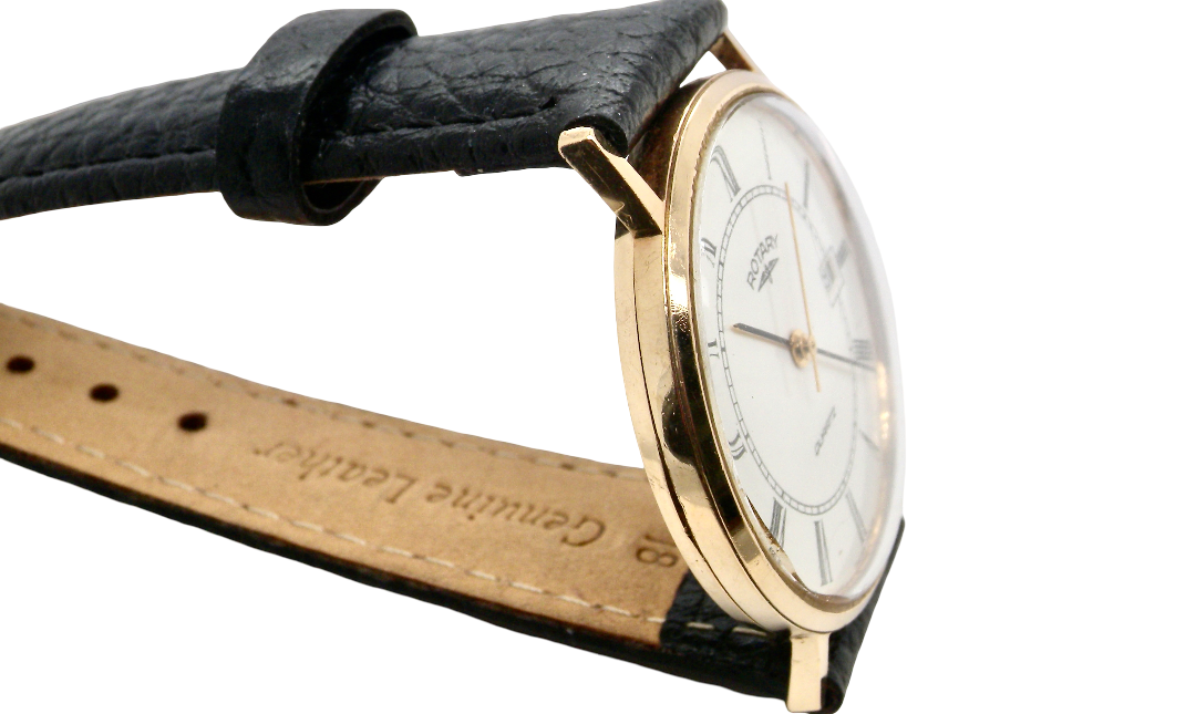 side A gentleman's 9 carat gold wrist watch. Plain white dial with roman numerals, sweep seconds hand, and a calendar date window.
Case measures 32mm. Quartz movement. Signed by Rotary.