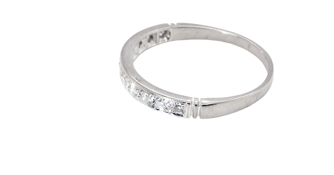 side A half hoop eternity ring. Set with eleven small white diamonds, brilliant cut 2mm each (total est 0.33 carats) colour i-k, clarity Si.