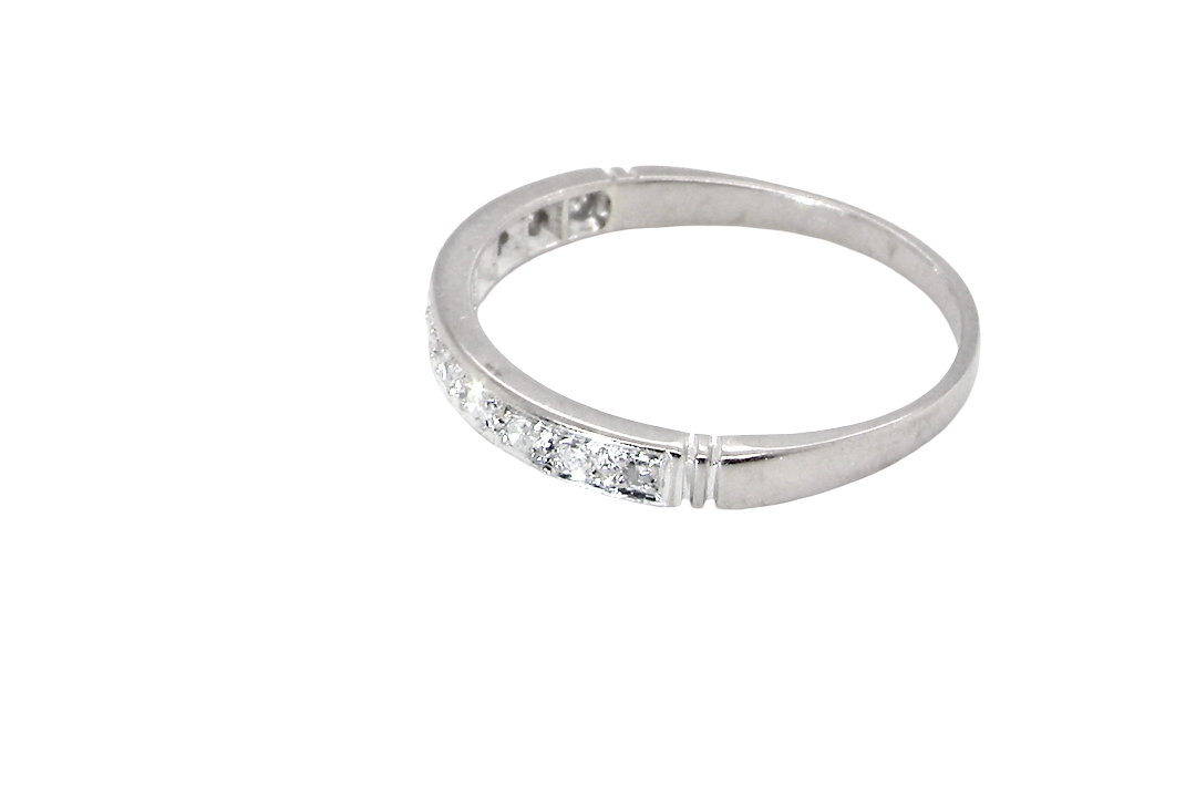 side A half hoop eternity ring. Set with eleven small white diamonds, brilliant cut 2mm each (total est 0.33 carats) colour i-k, clarity Si.