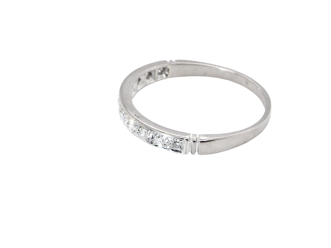 side A half hoop eternity ring. Set with eleven small white diamonds, brilliant cut 2mm each (total est 0.33 carats) colour i-k, clarity Si.