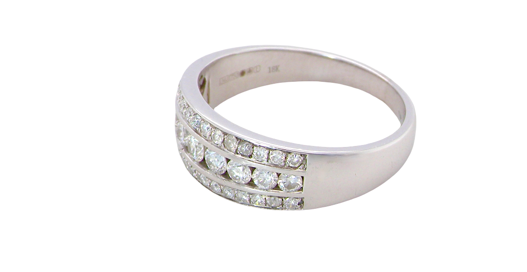 side A lovely 18 carat white gold half hoop ring. Set with a middle row of nine bright white brilliant cut diamonds, graduate from 2.2mm to 2.6mm. The top and bottom rows are also set with small diamonds.