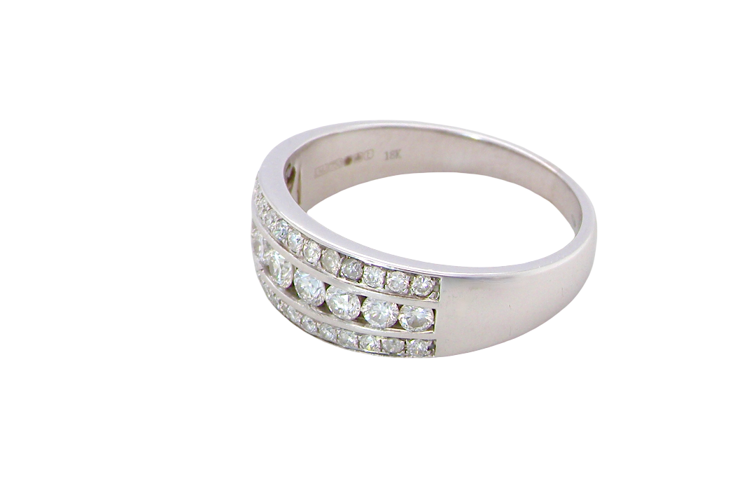side A lovely 18 carat white gold half hoop ring. Set with a middle row of nine bright white brilliant cut diamonds, graduate from 2.2mm to 2.6mm. The top and bottom rows are also set with small diamonds.
