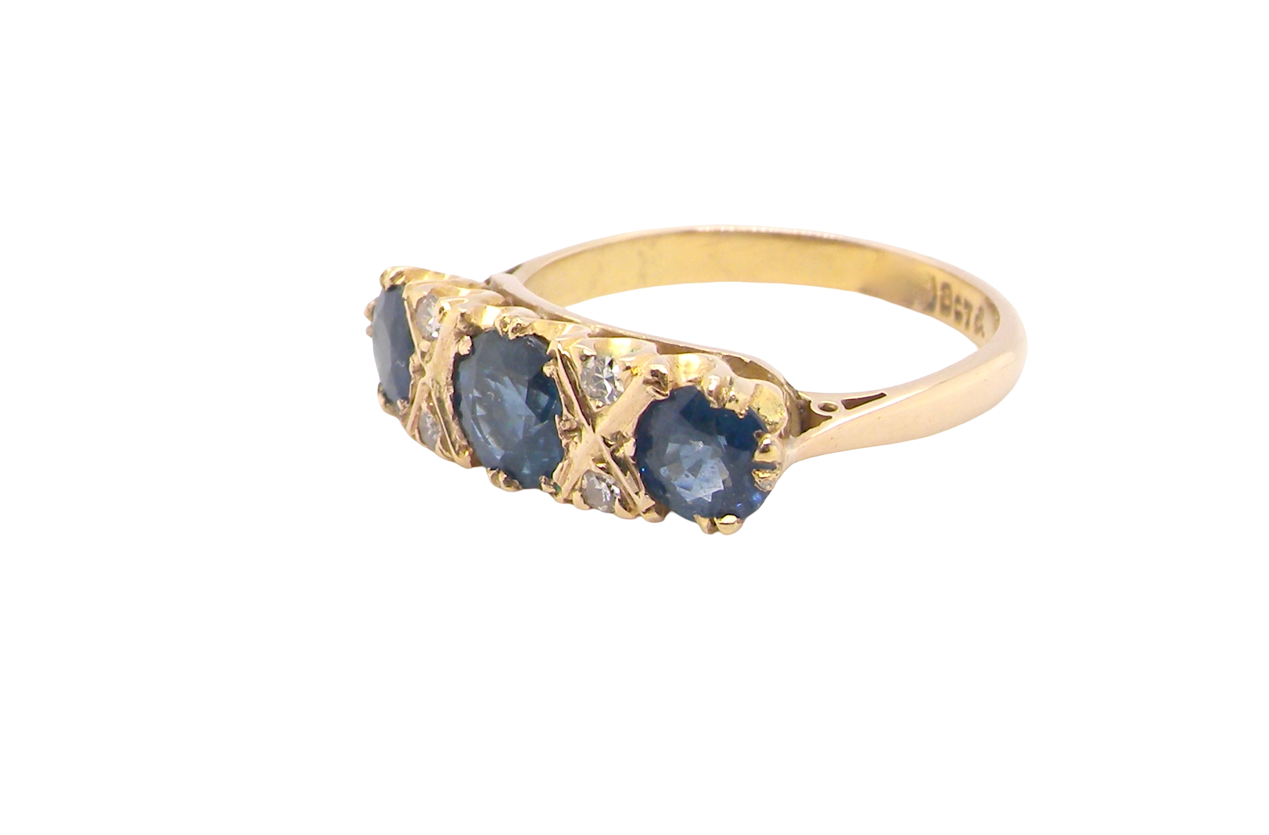 side A lovely ring from the turn of the 19th century. Set with impressive round sapphires,