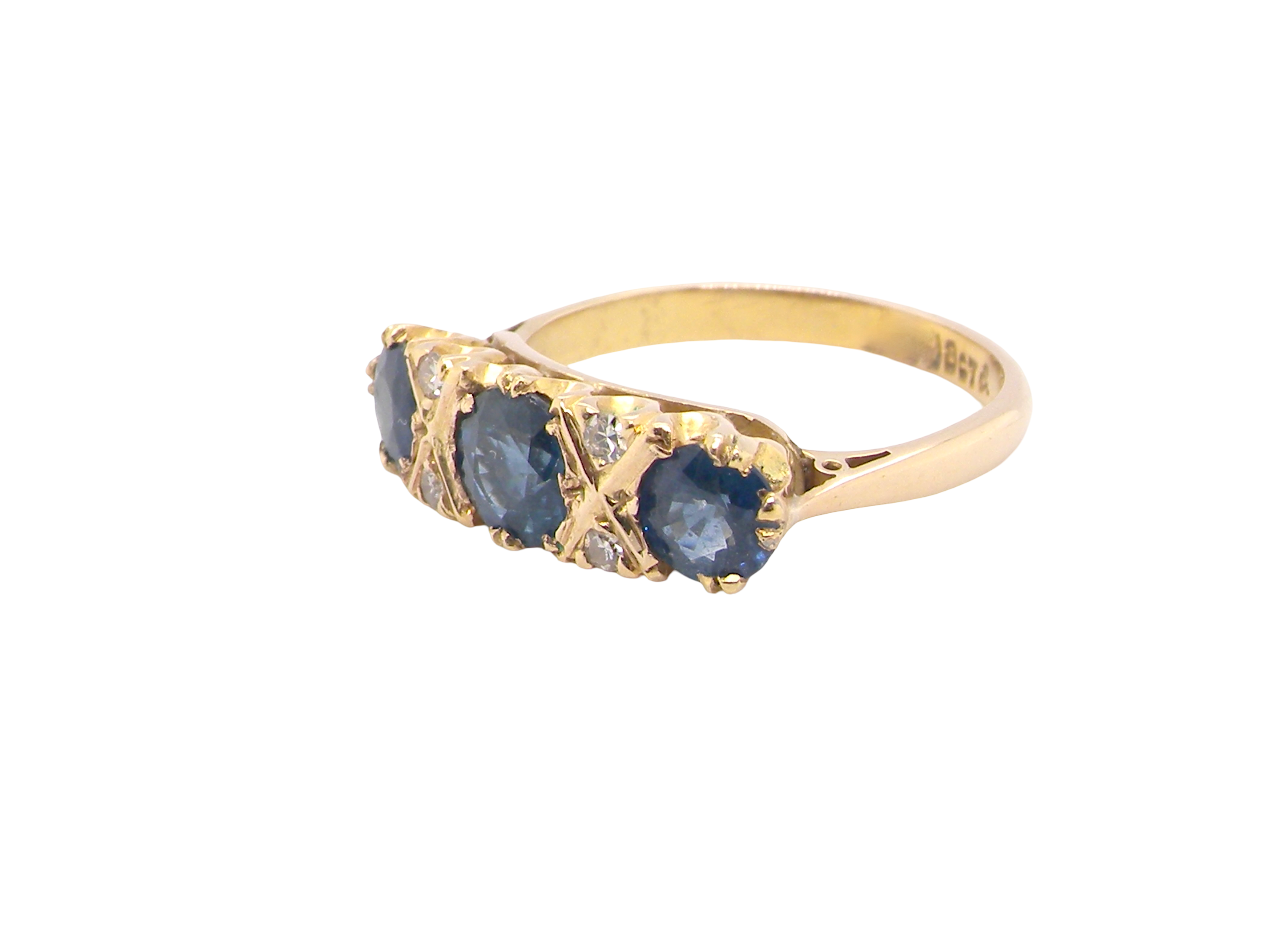 side A lovely ring from the turn of the 19th century. Set with impressive round sapphires,