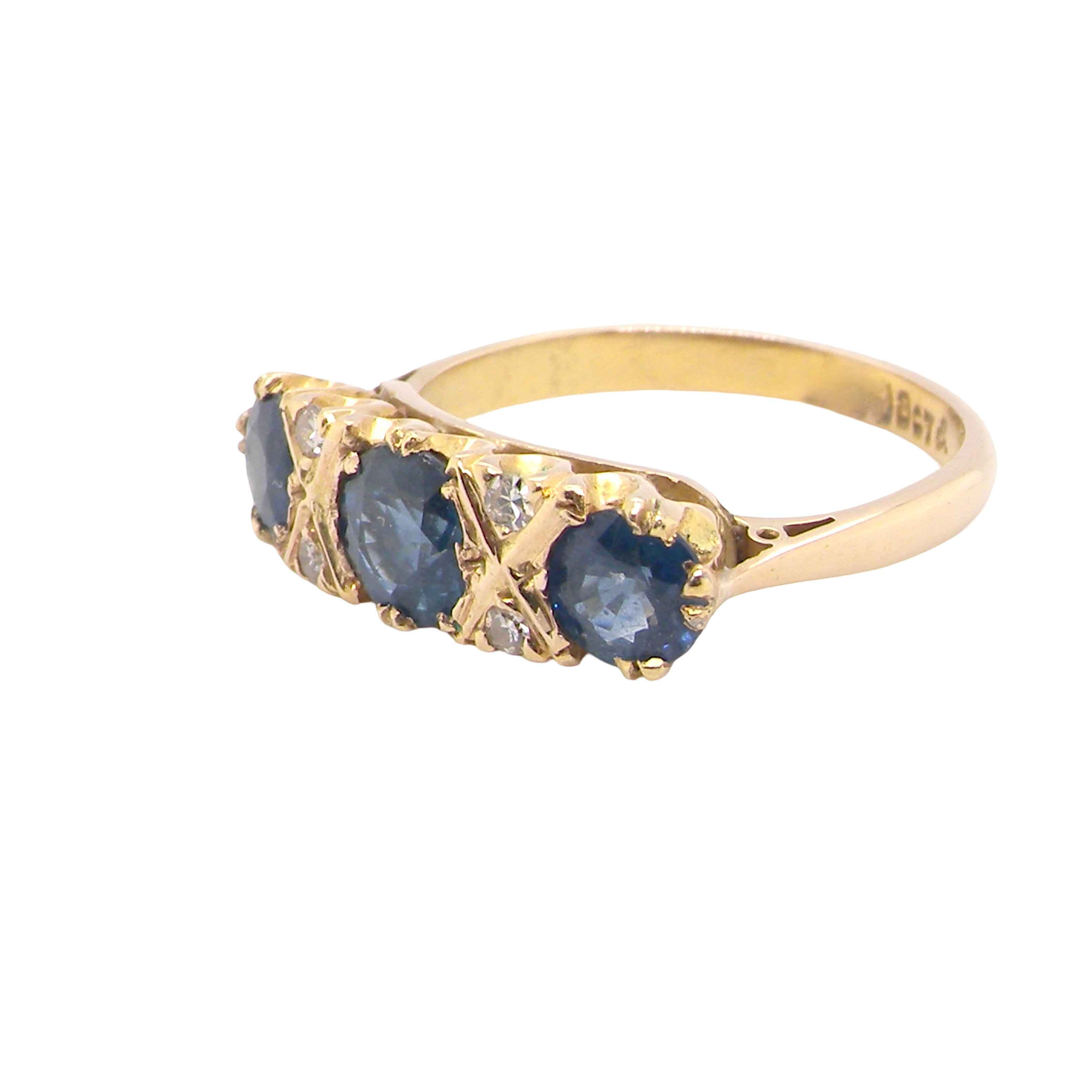 side A lovely ring from the turn of the 19th century. Set with impressive round sapphires,