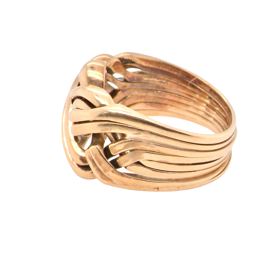 A man's gold Puzzle ring